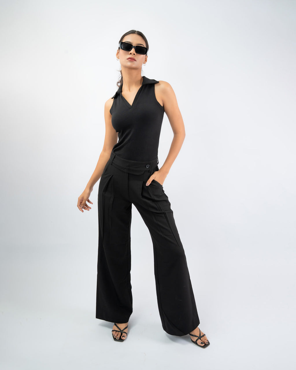 Women’s black rib knit sleeveless polo top, fitted casual everyday wear