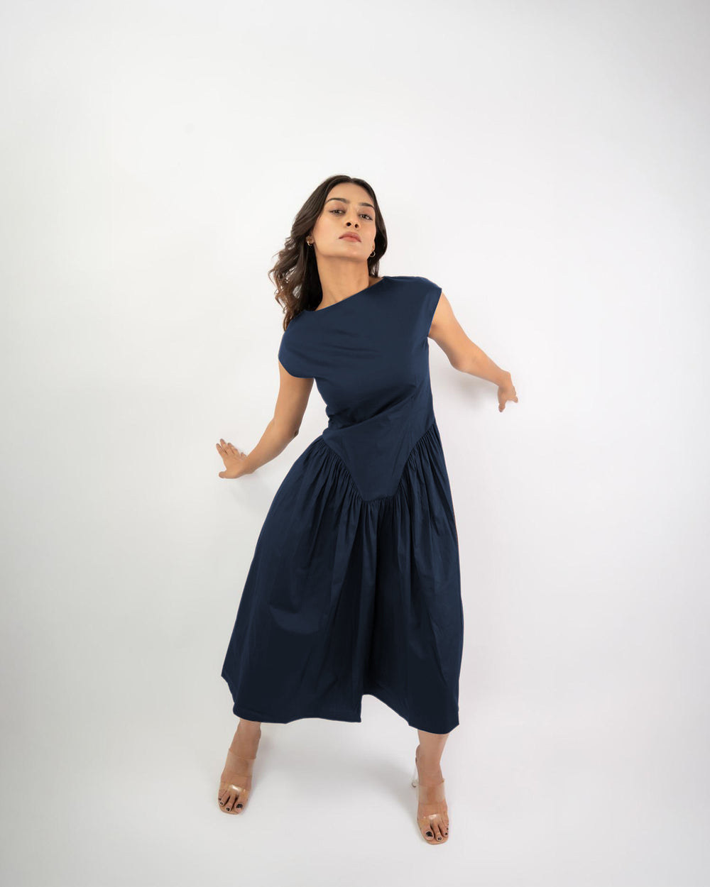 Women’s blue midi dress with boat neck and flared shape, comfortable elegant outfit