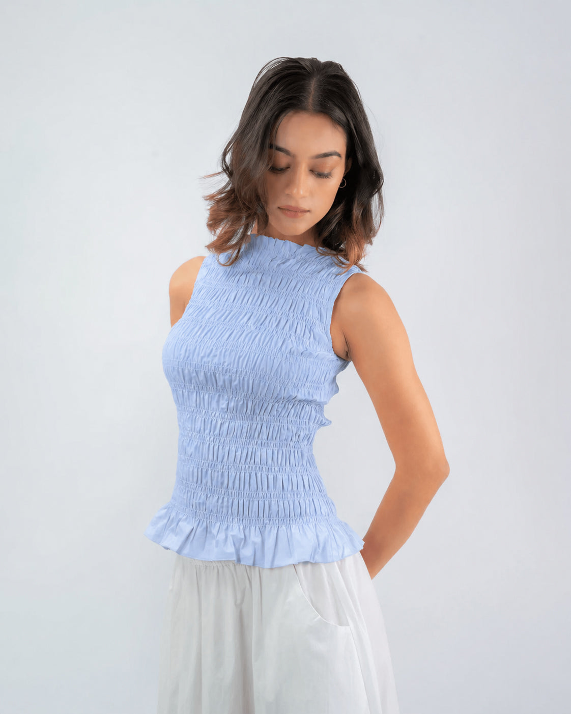 Smocked Sleeveless Peplum Top