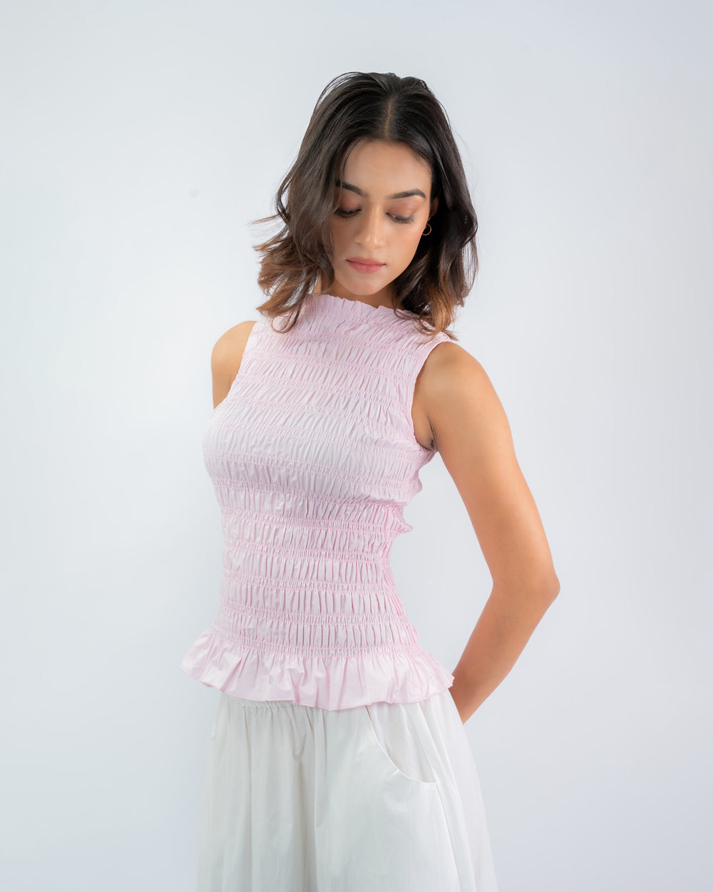 Smocked Sleeveless Peplum Top