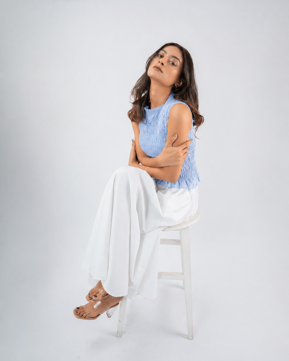Smocked Sleeveless Peplum Top