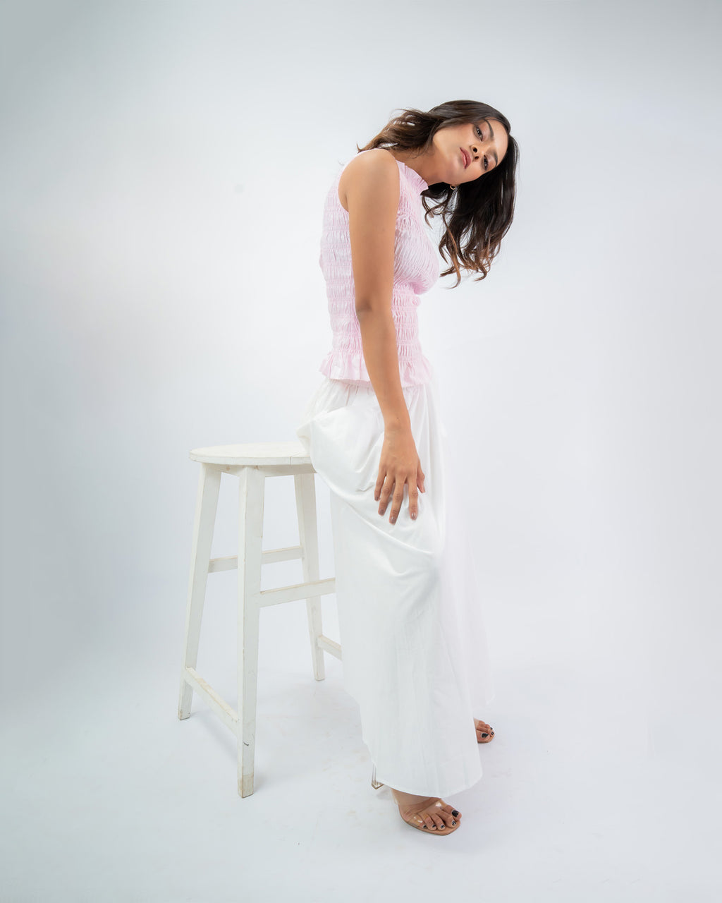 Sleeveless smocked peplum top for women, flattering stretch fit cotton outfit