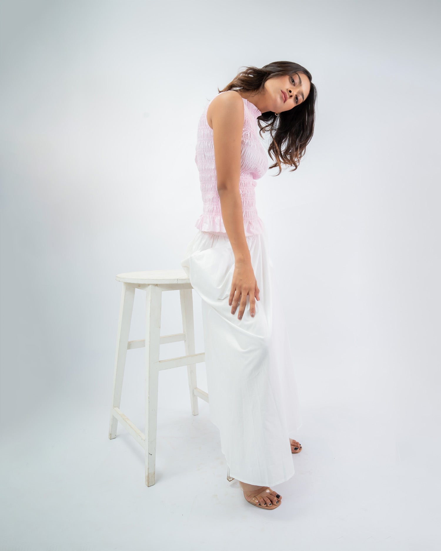 Sleeveless smocked peplum top for women, flattering stretch fit cotton outfit