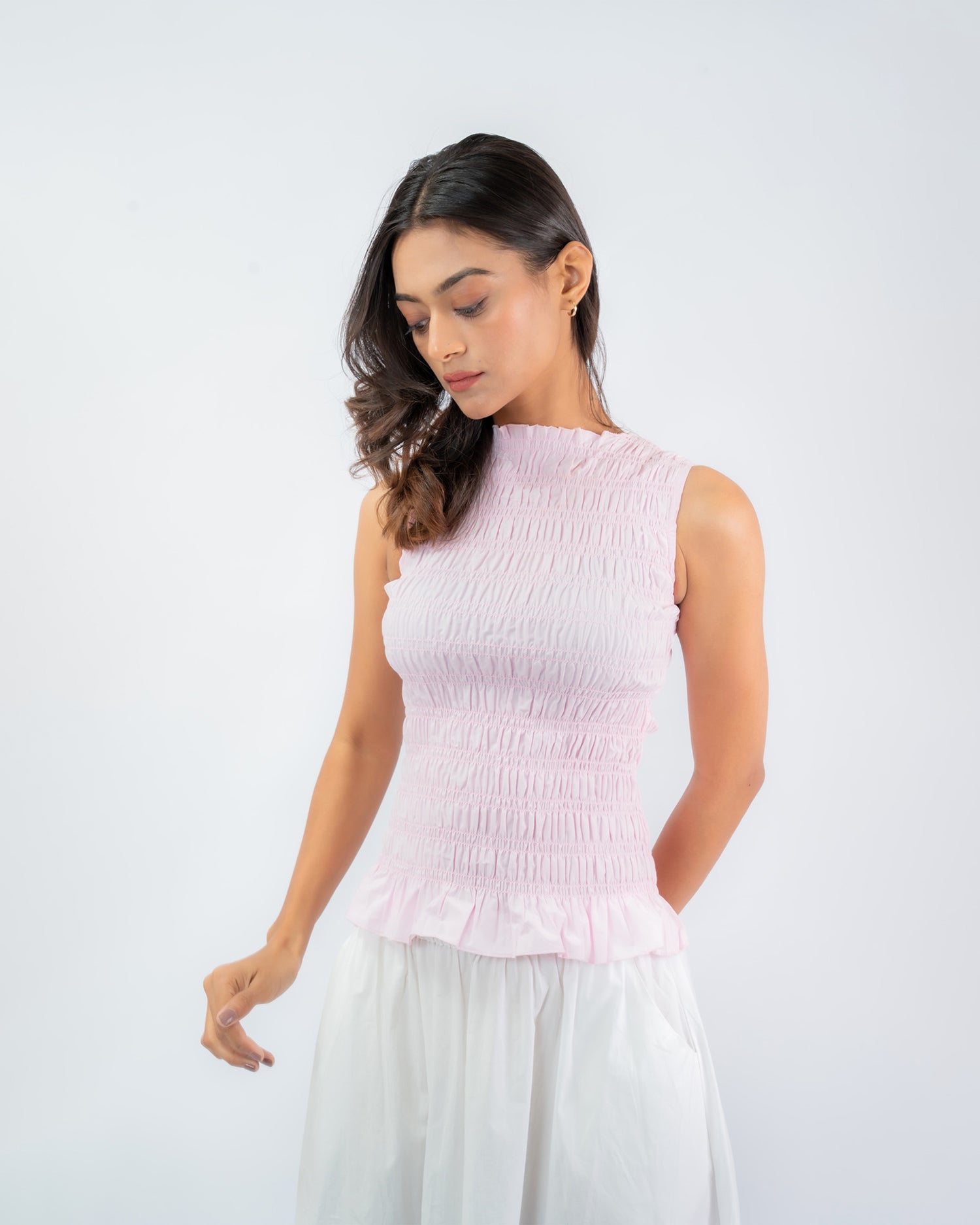 Women’s smocked sleeveless peplum top, fitted cotton summer casual wear”