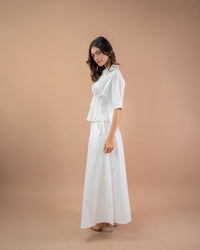 Women’s white shirt and flared maxi skirt outfit, breathable cotton minimal fashion look