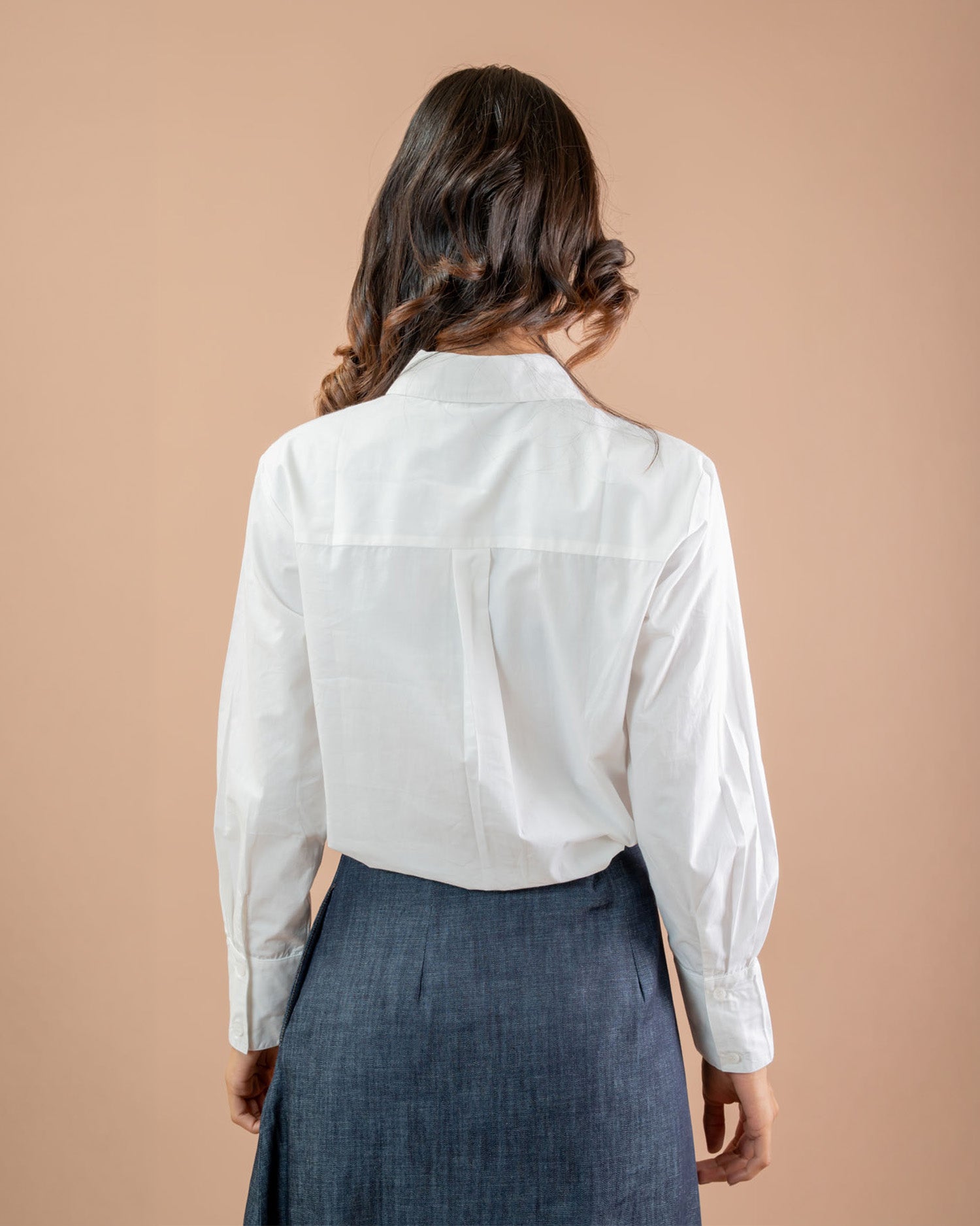 Minimal women’s outfit denim skirt with relaxed shirt, soft cotton everyday fashion